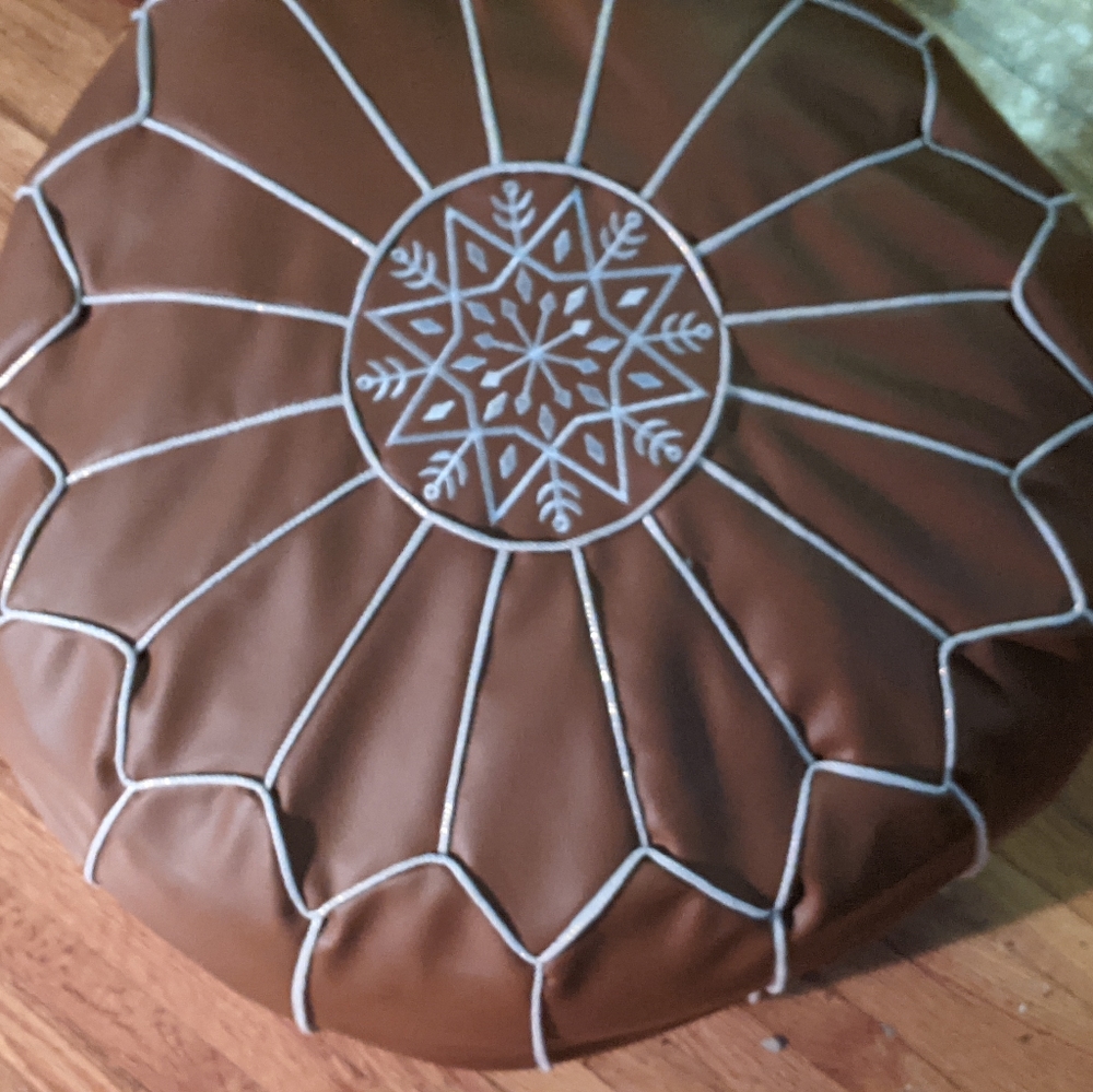 Faux leather ottoman pouf